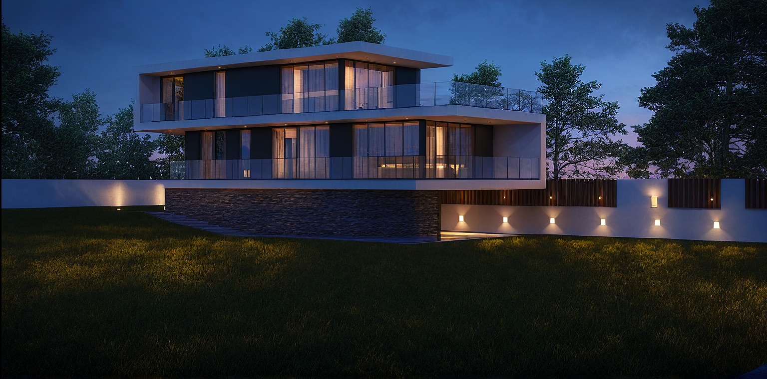 Dwukondygnacyjny dom z płaskim dachem oświetlony nocą, z widoczną elewacją z kamienia i dużymi przeszkleniami, otoczony zielenią i ogrodzeniem z lampami.