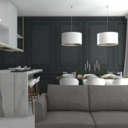 Wnętrze nowoczesnej kuchni z marmurową wyspą, drewnianymi szafkami i minimalistycznym oświetleniem, widok z salonu z szarą sofą na pierwszym planie.