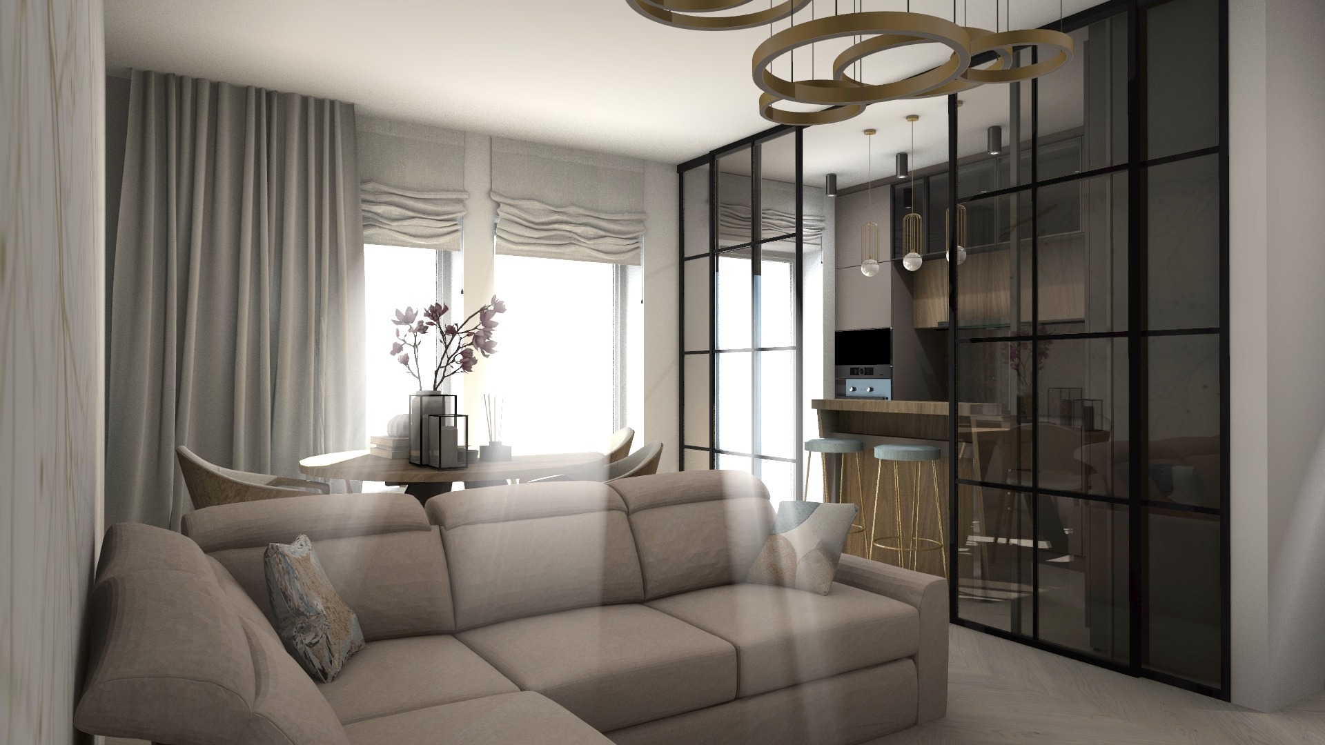 Wnętrze salonu z aneksem kuchennym oddzielonym szklaną ścianką działową w czarnej ramie; beżowa sofa narożna, okrągły stół z krzesłami, oświetlenie w formie złotych pierścieni.