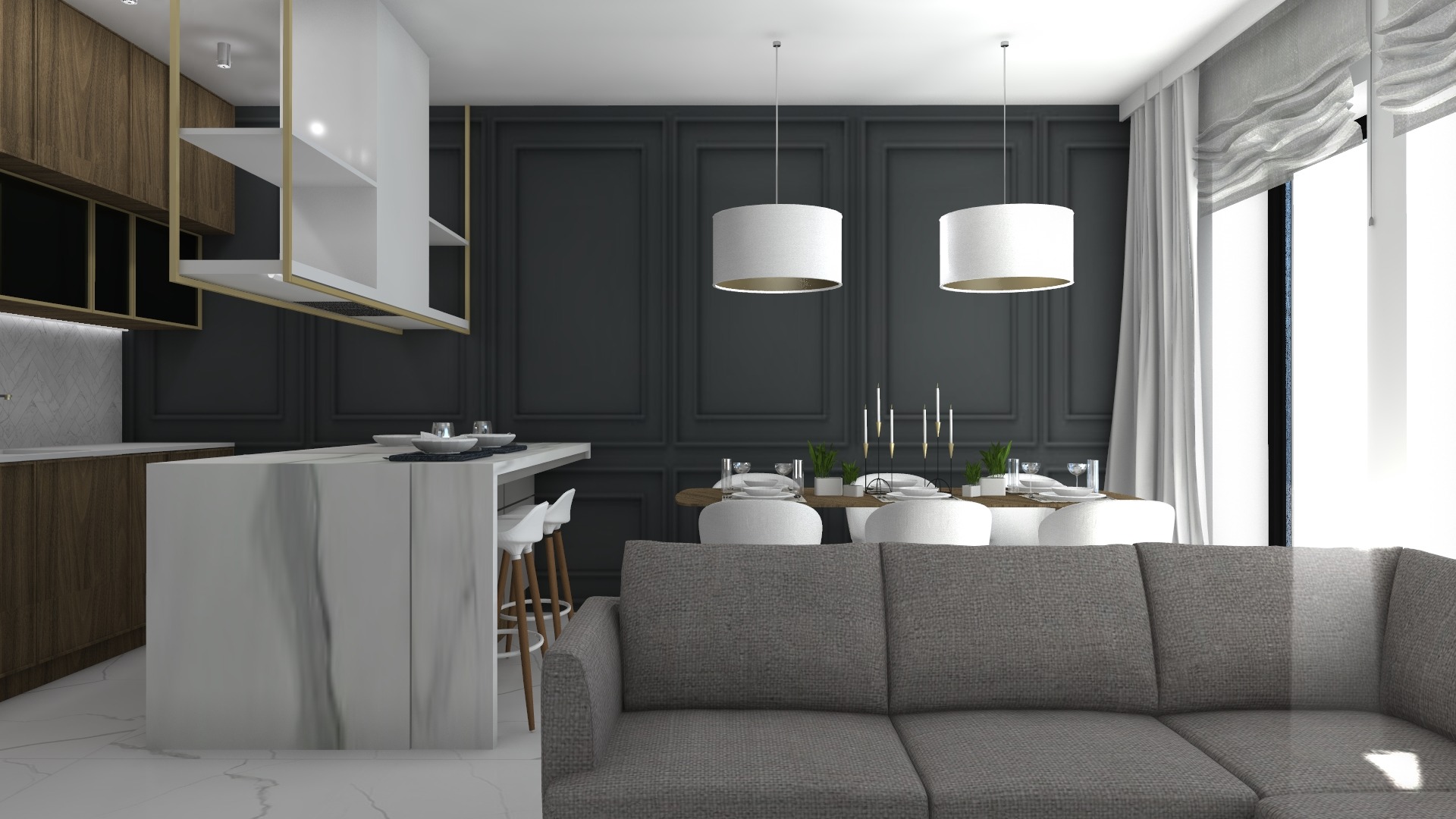 Wnętrze nowoczesnej kuchni z marmurową wyspą, drewnianymi szafkami i minimalistycznym oświetleniem, widok z salonu z szarą sofą na pierwszym planie.