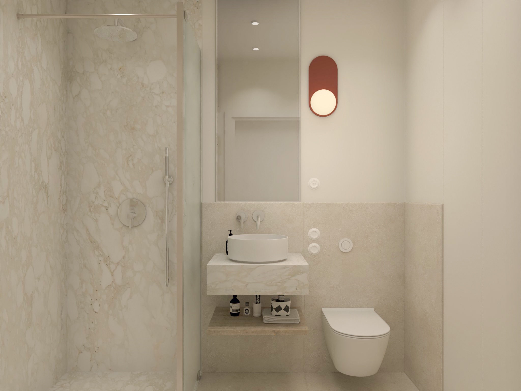Nowoczesna łazienka z kabiną prysznicową wyłożoną marmurem, okrągłą umywalką nablatową na marmurowym blacie, podwieszaną toaletą i podświetlanym lustrem w kształcie zaokrąglonego prostokąta.