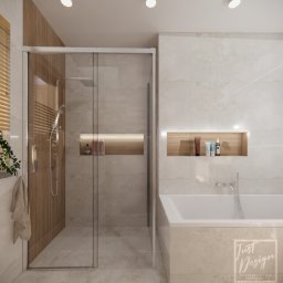 Just Design Justyna Staniszewska - Wizualizacja nowoczesnej łazienki z kabiną prysznicową typu walk-in, beżowymi płytkami, drewnianymi akcentami w niszach ściennych z oświetleniem LED oraz białą wanną.