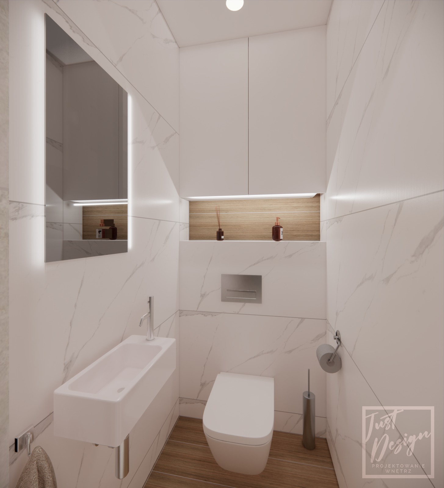 Wizualizacja małej łazienki z marmurowymi płytkami, wiszącą toaletą i umywalką w kształcie prostokąta, oświetlona półka z dekoracjami, logo projektanta w prawym dolnym rogu.