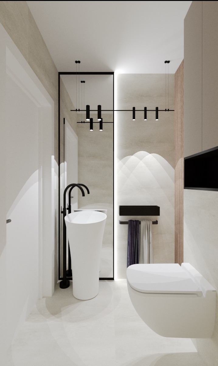 Nowoczesna łazienka z wolnostojącą umywalką, podwieszaną toaletą, czarną armaturą i minimalistycznym oświetleniem, wykończona w jasnych, neutralnych barwach z akcentami drewna.