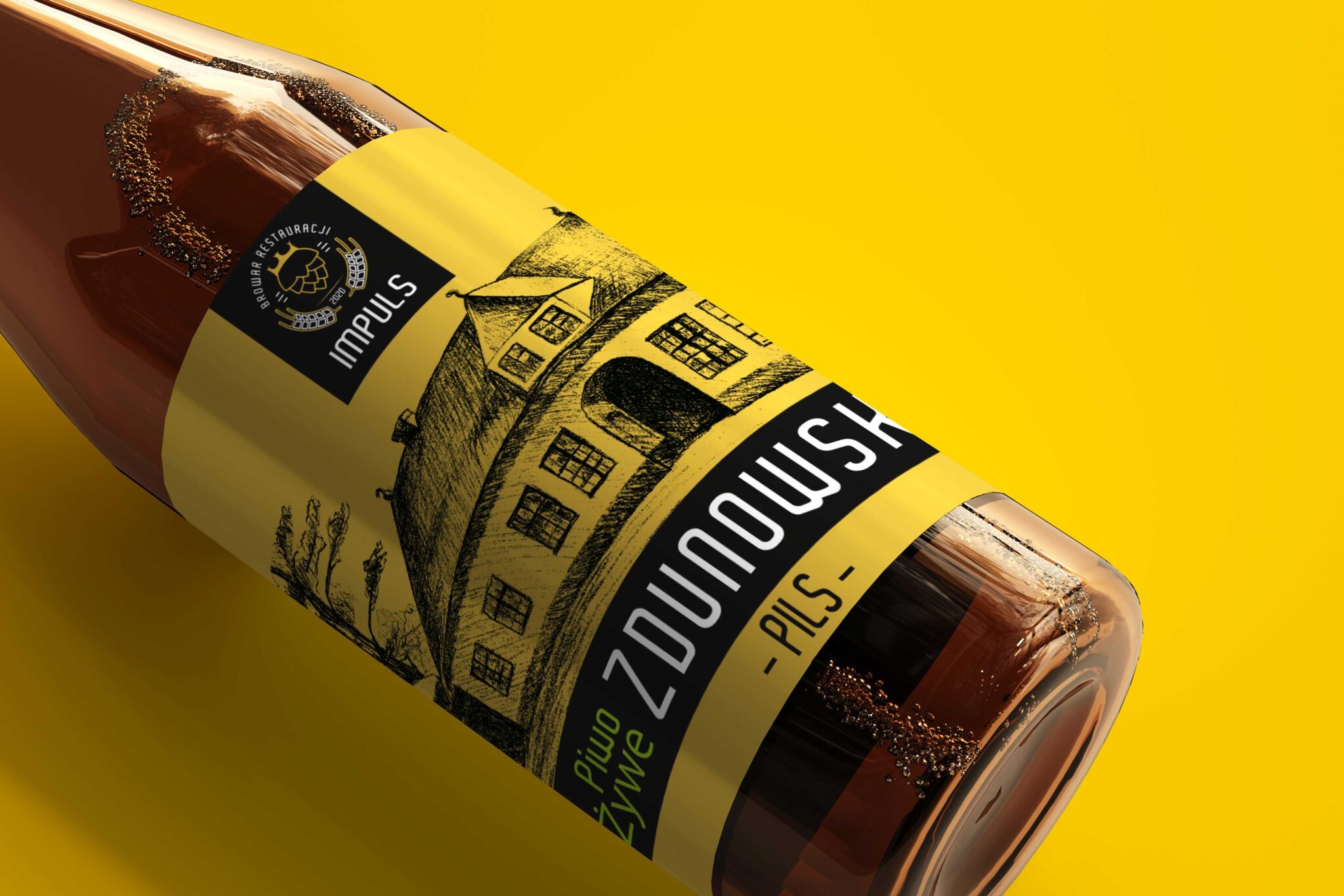 Butelka premierowego piwa Browaru Impuls z etykietą przedstawiającą szkic budynku i logo browaru na żółtym tle.