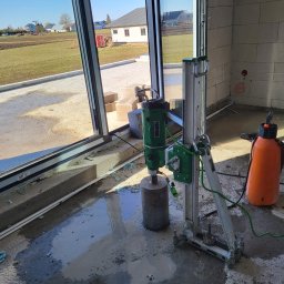 Wiercenie otworów i przepustów w betonie. 