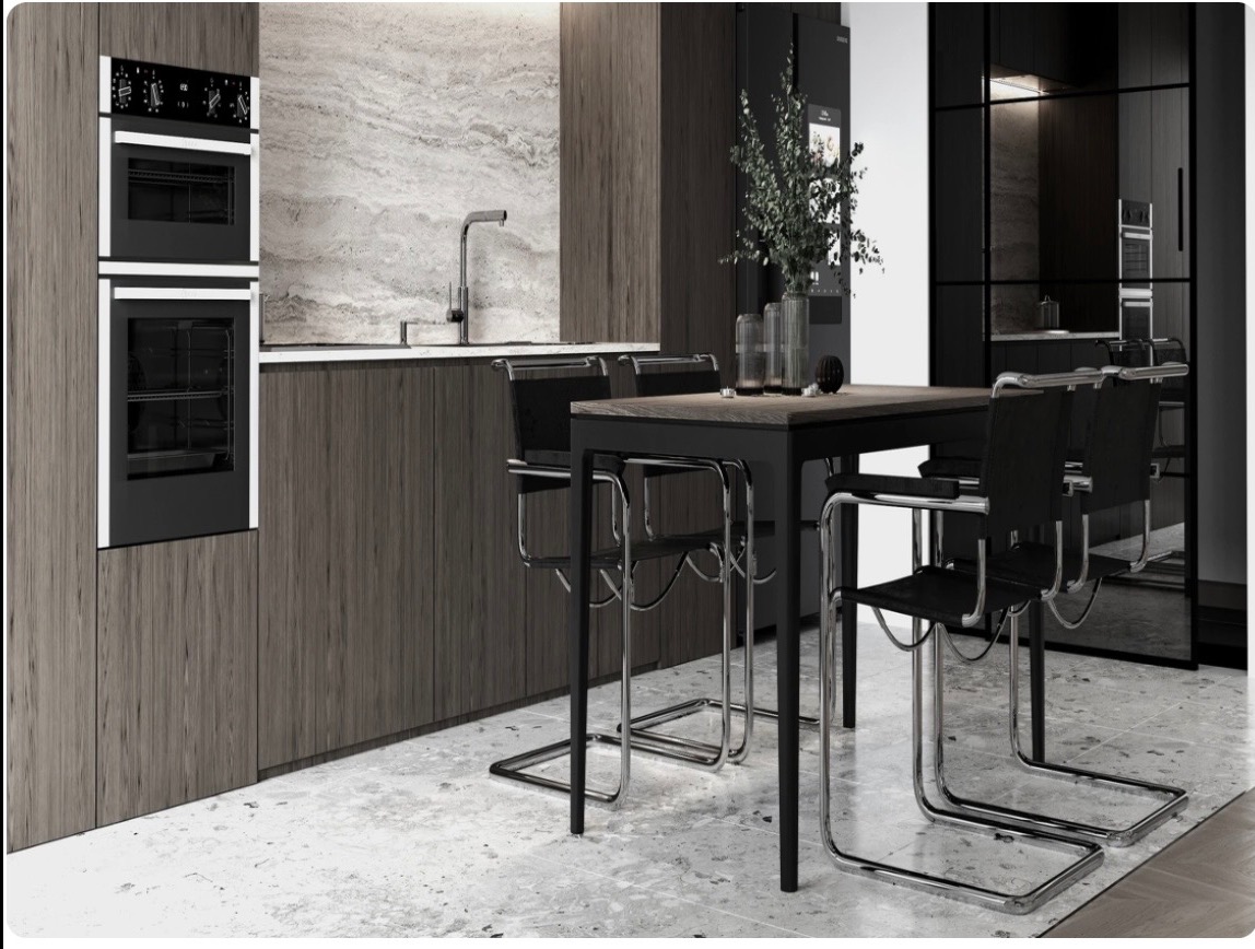 Nowoczesna kuchnia w odcieniach szarości z zabudową drewnopodobną, wbudowanym piekarnikiem i minimalistycznym stołem z krzesłami. Stonowana kolorystyka i elegancki design.