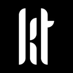 Białe, stylizowane litery 'kt' na czarnym tle, tworzące logo firmy.