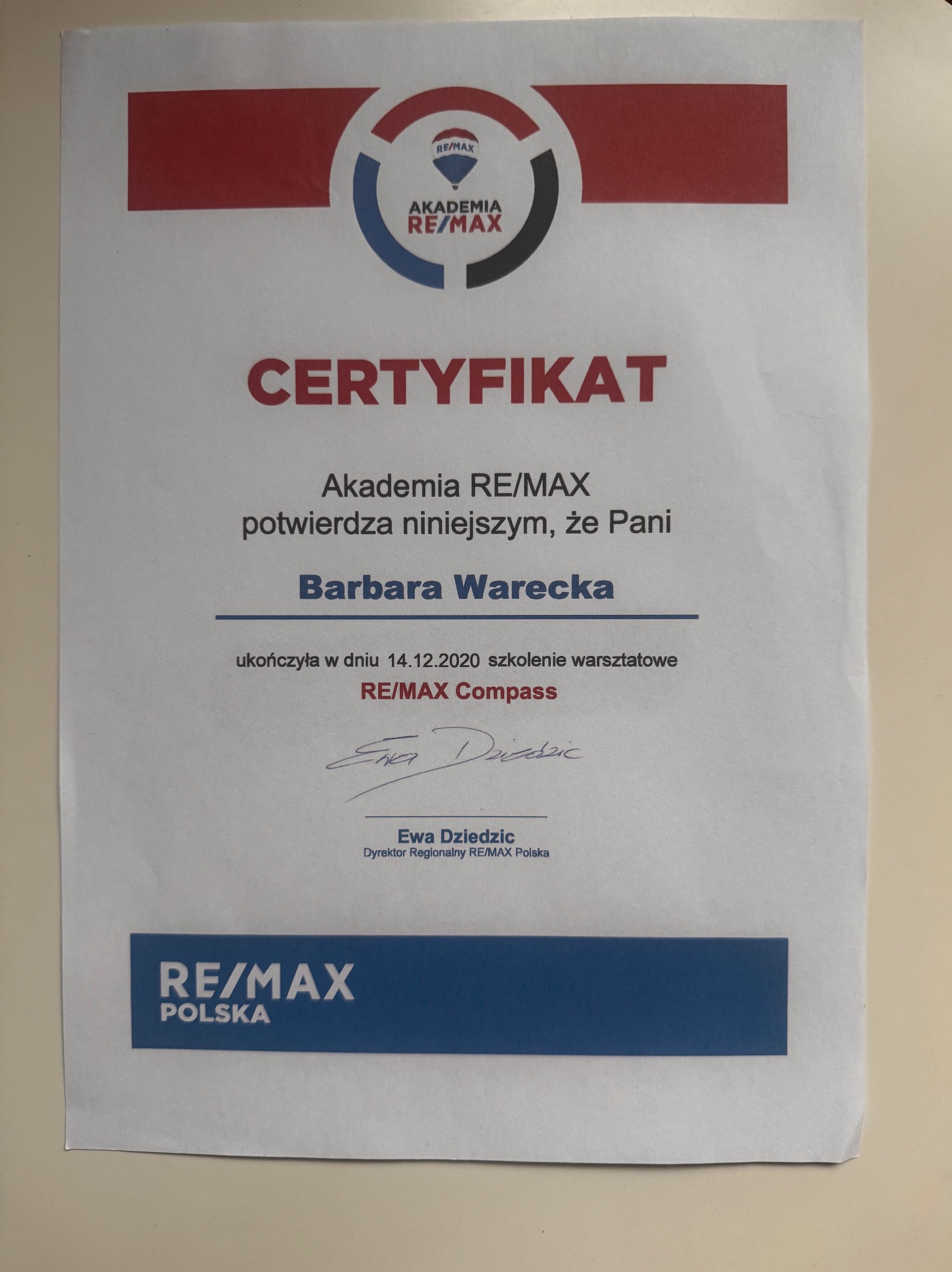 Certyfikat Akademii RE/MAX dla Barbary Wareckiej za ukończenie szkolenia warsztatowego, z podpisem Ewy Dziedzic, Dyrektor Regionalnej RE/MAX Polska.