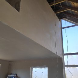 Home Future Chojnowski Andrzej - Tynki hybrydowe w domu jednorodzinnym w Mrągowie