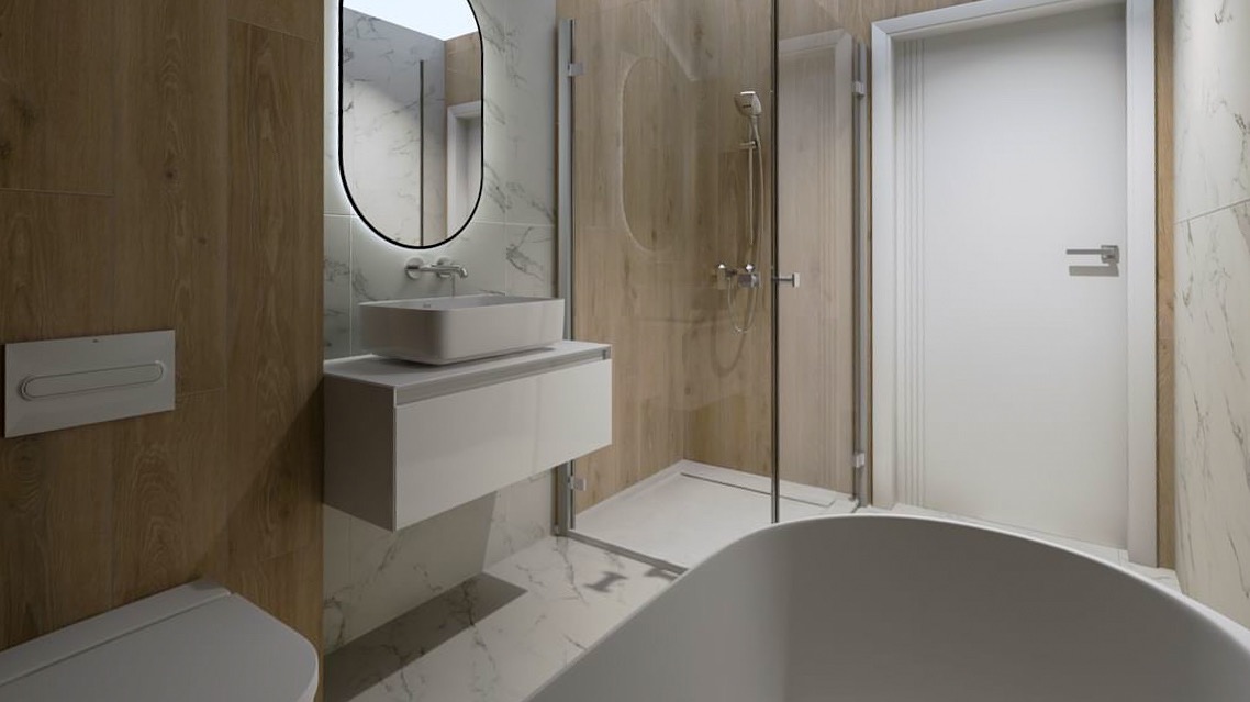 Nowoczesna łazienka z drewnopodobnymi płytkami, owalnym lustrem z podświetleniem LED, białą umywalką nablatową na szafce i kabiną prysznicową ze szklanymi drzwiami, widoczny fragment wanny...