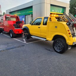 Pomoc drogowa i holownik widłowy (motyl). Profesjonalne holowanie aut dostawczych i terenowych. Szybki transport pojazdów, holowanie bez uszkodzeń, autolaweta 24h. Obsługa trudnych zleceń.