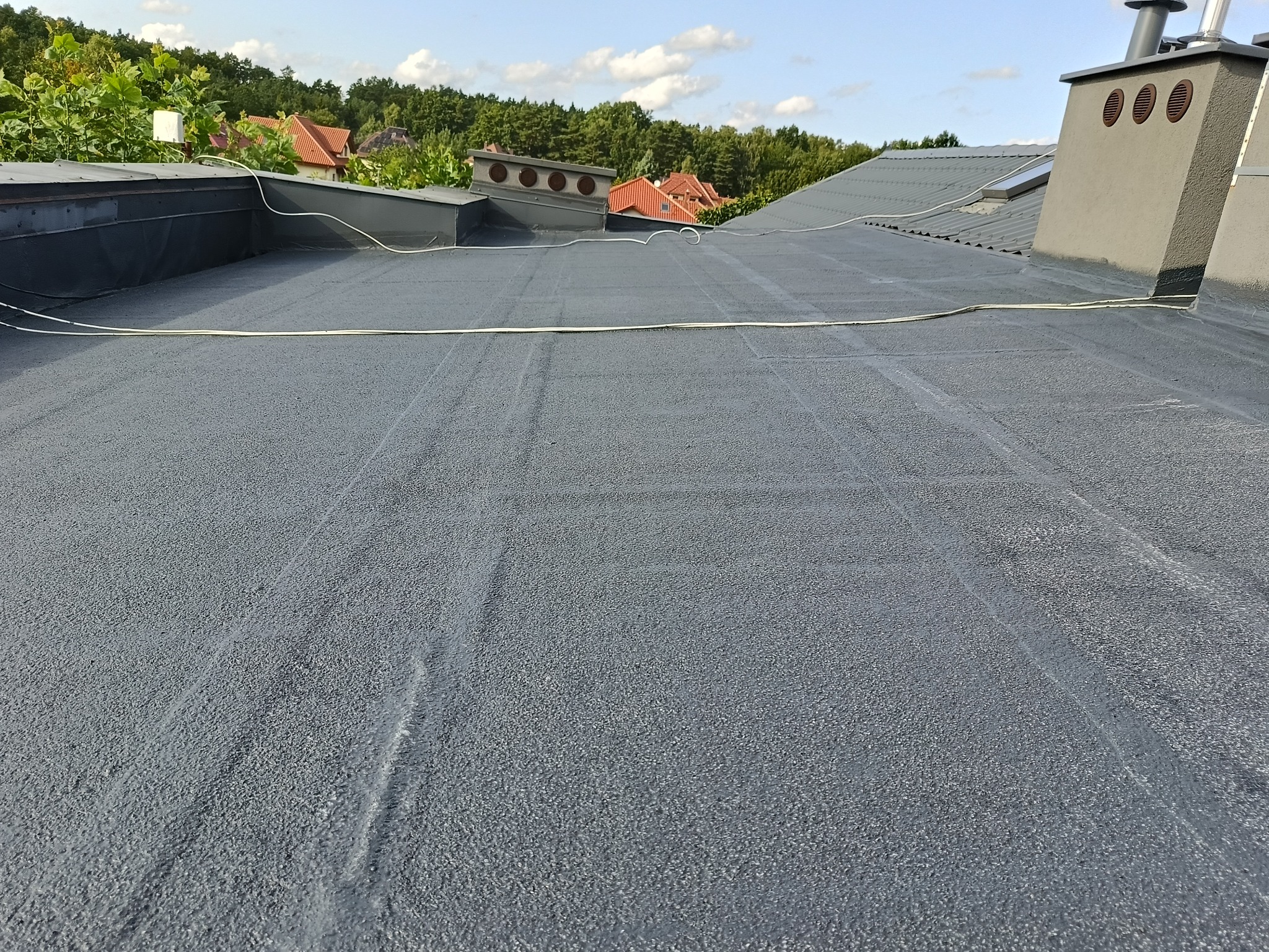 Wykonane zlecenie to Malowanie papą w płynie