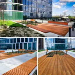 Drewniany taras z ławkami w Global Office Park w Katowicach, otoczony nowoczesną architekturą biurową i zielenią.