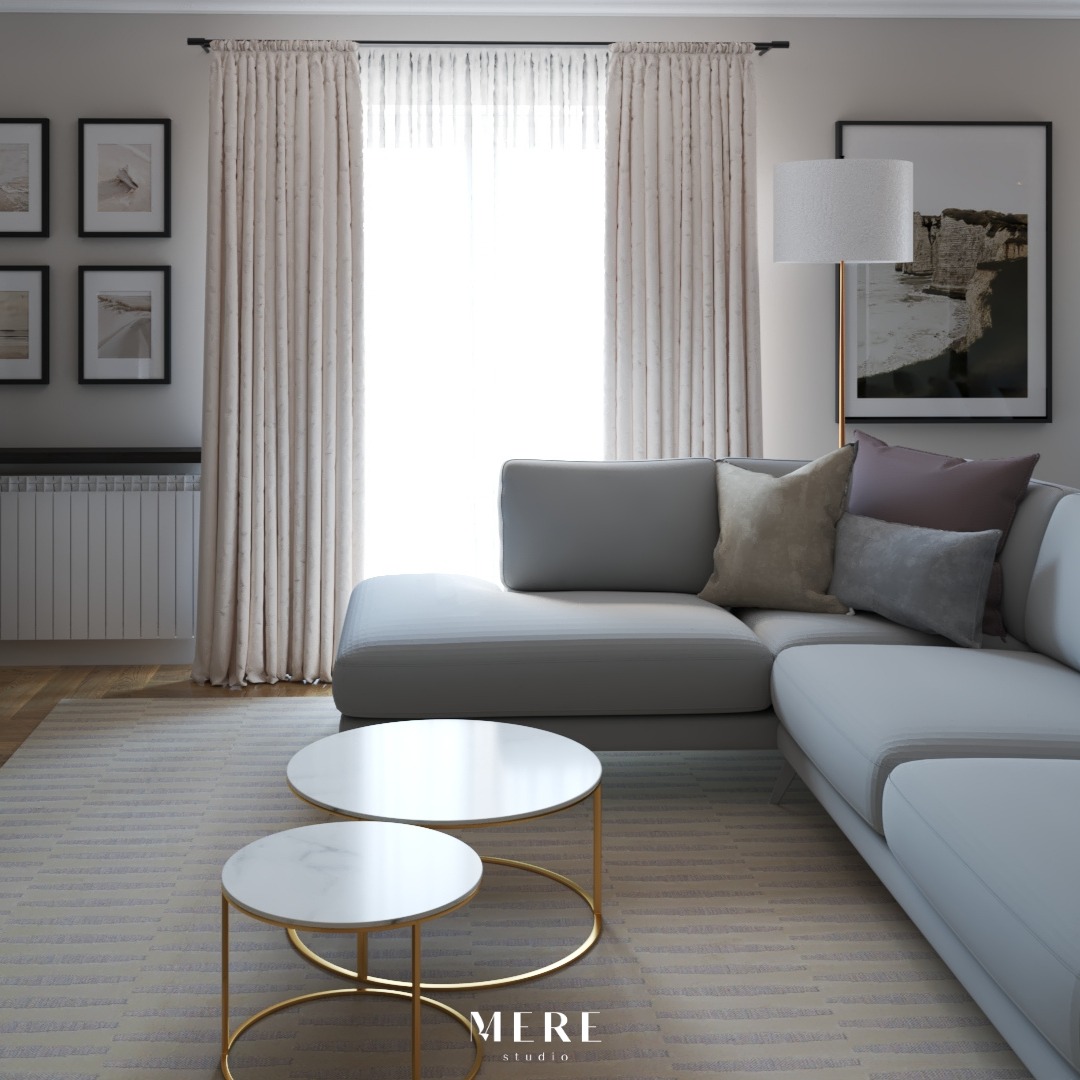 Wizualizacja salonu w Łodzi: szary narożnik z poduszkami, dwie okrągłe marmurowe stoliki kawowe ze złotymi nogami, beżowe zasłony i grafiki na ścianie.