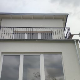 Wykonana elewacja ,balustrada , orynowanie 