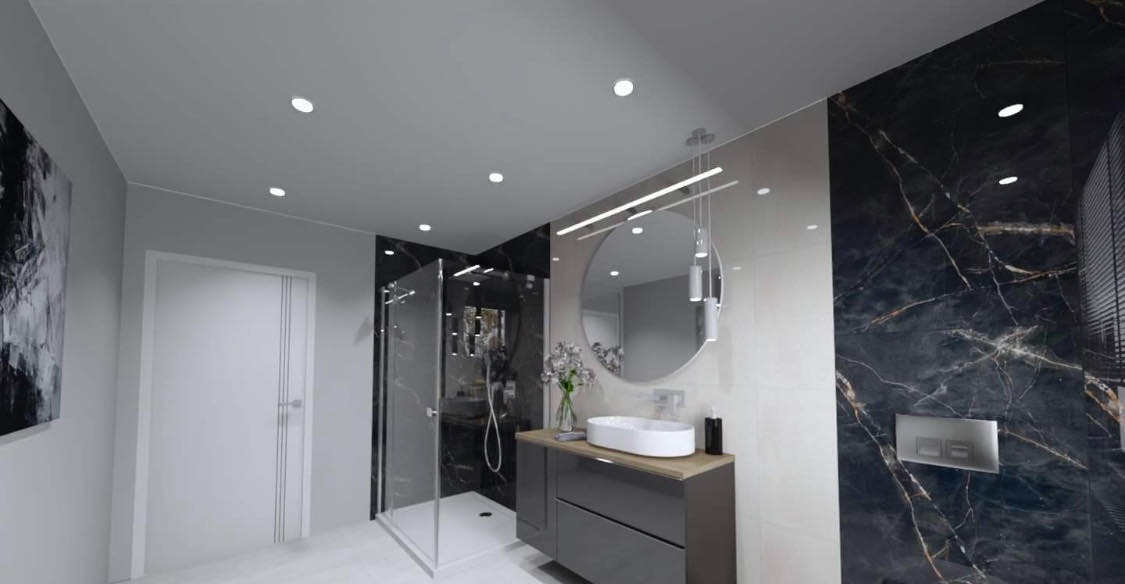 Wizualizacja nowoczesnej łazienki z kabiną prysznicową typu walk-in, umywalką nablatową na szarej szafce i czarnymi płytkami imitującymi marmur.