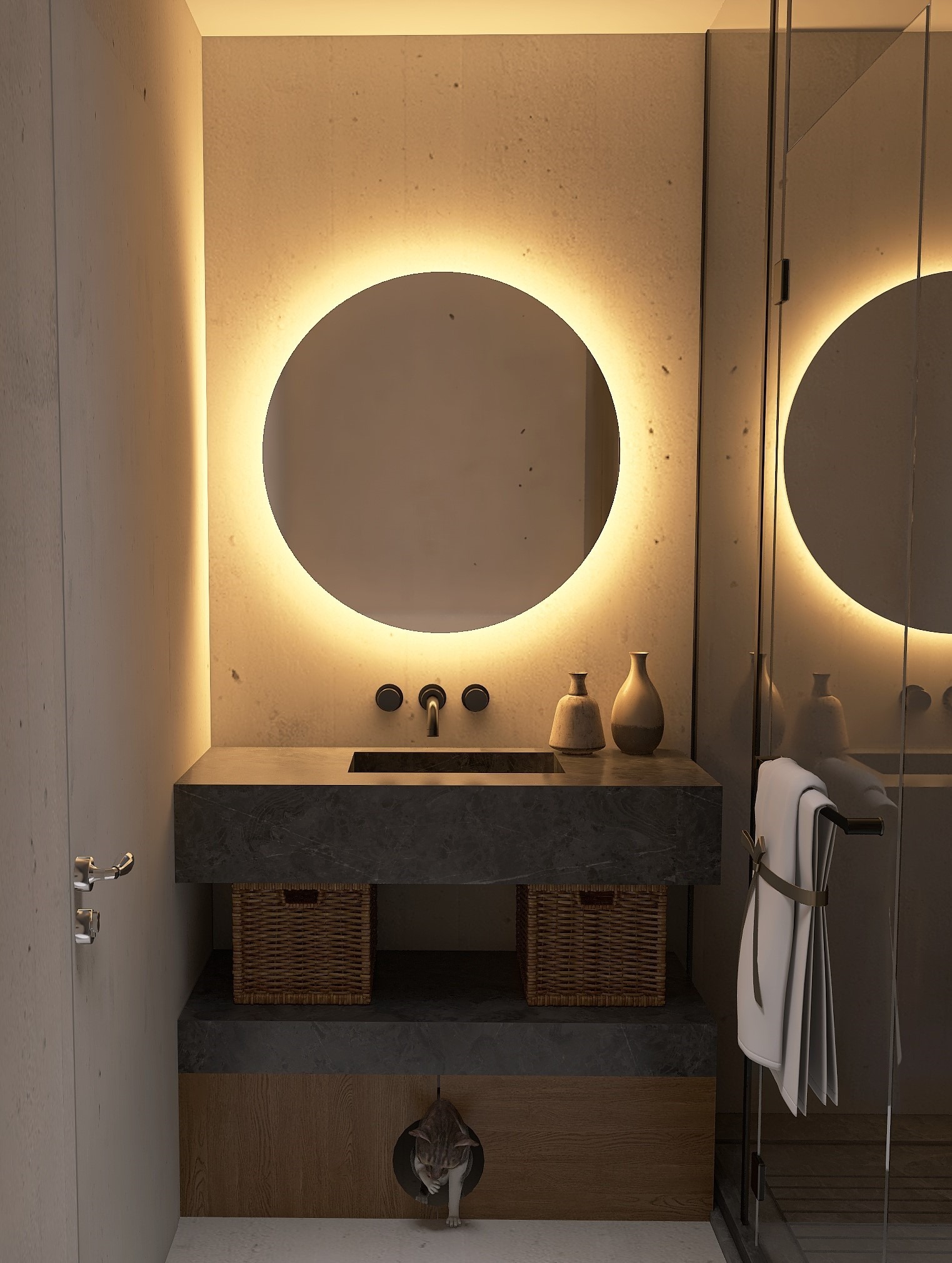 Nowoczesna łazienka z okrągłym lustrem podświetlanym LED, ciemnym blatem z kamienia, wiklinowymi koszami pod umywalką i otworem dla kota w dolnej części szafki.