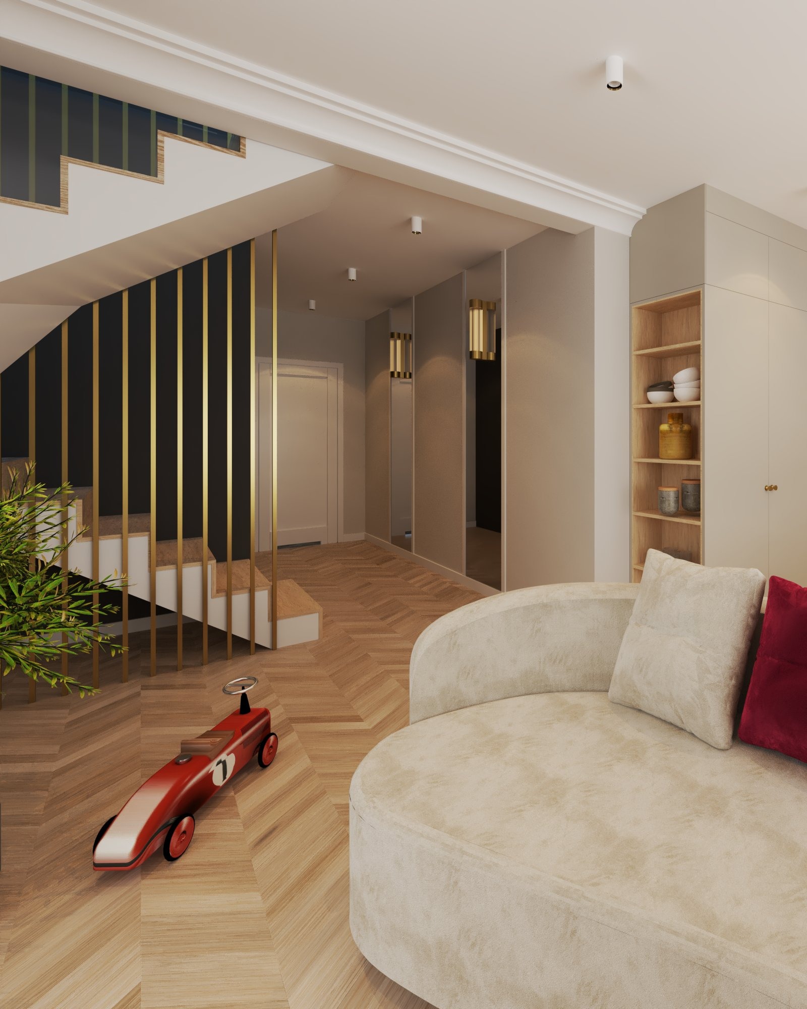 Nowoczesne wnętrze domu z drewnianą podłogą w jodełkę, schodami z czarną ścianą i złotymi akcentami, okrągłą sofą w odcieniach beżu oraz zabawką - czerwonym autkiem.