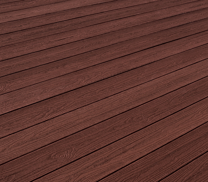 Ciemnobrązowa deska tarasowa z wyraźnym usłojeniem, ułożona pod kątem, ukazująca fakturę drewna.