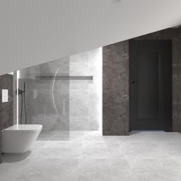 Weronika Więczkowska - Minimalistyczna łazienka na poddaszu z szarą marmurową okładziną ścian i podłogi, wisząca toaleta i kabina prysznicowa z podświetleniem LED oraz czarne drzwi.