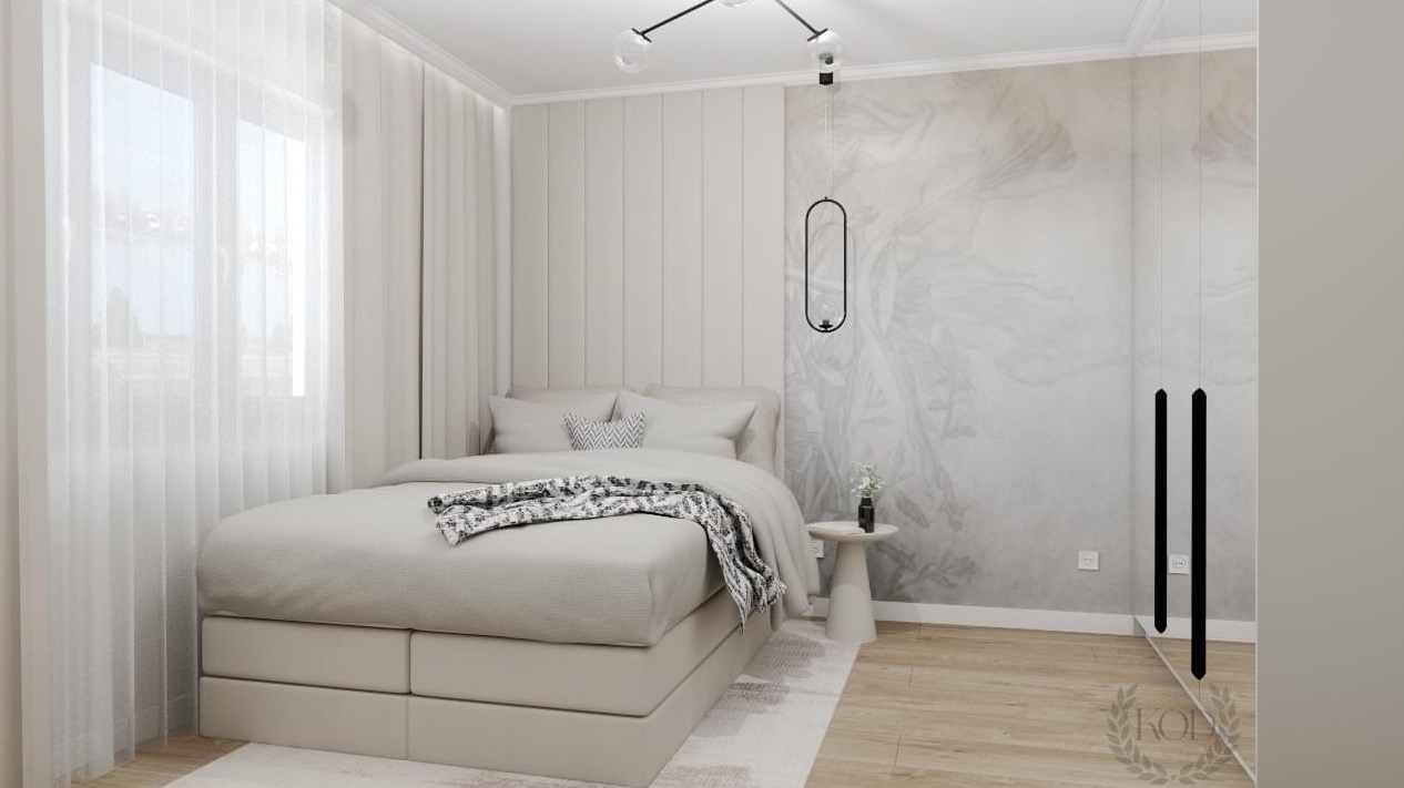 Jasna sypialnia z łóżkiem kontynentalnym, panelem ściennym, wzorzystą tapetą i lampą wiszącą w kształcie elipsy.