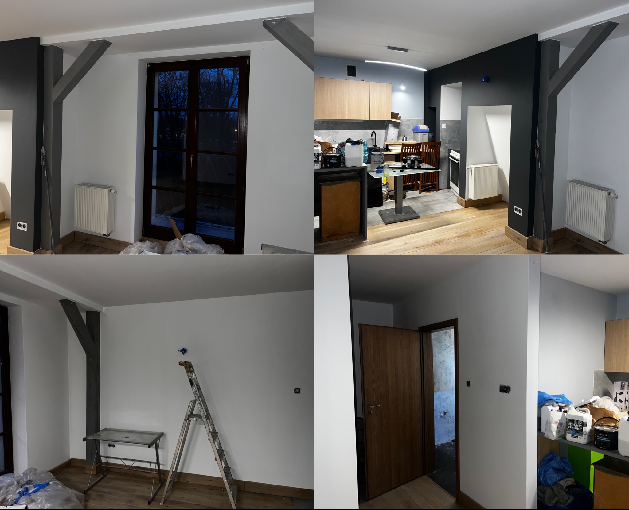 Wnętrze mieszkania w trakcie prac wykończeniowych: świeżo pomalowane ściany w odcieniach bieli i szarości, widoczna drabina, zakryte folią podłogi, oraz elementy wyposażenia kuchni w tle.