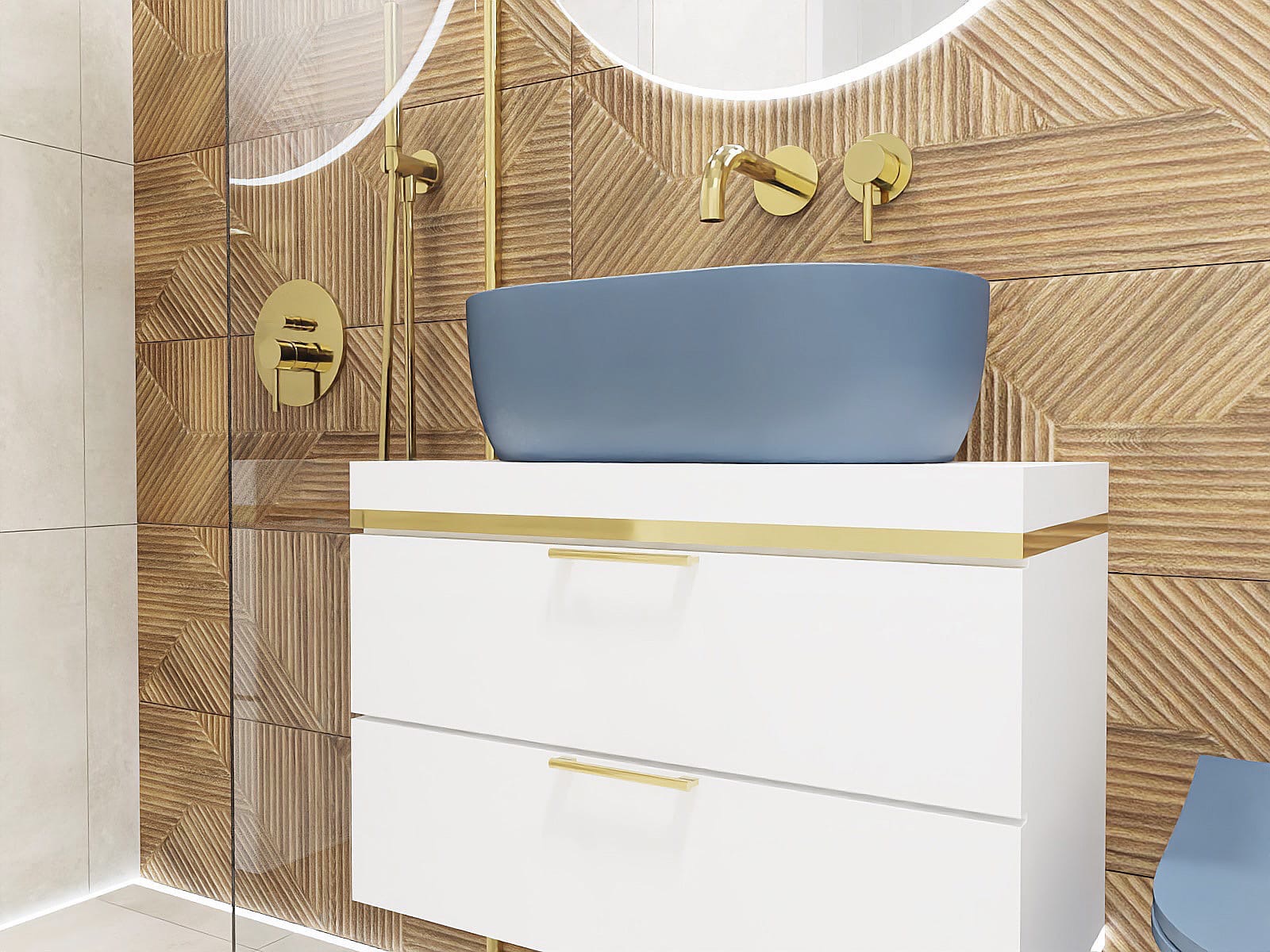 Nowoczesna łazienka z umywalką w kolorze gołębim na białej szafce z złotymi akcentami, drewnopodobne płytki ścienne w geometryczny wzór, złota armatura i okrągłe lustro z podświetleniem LED.