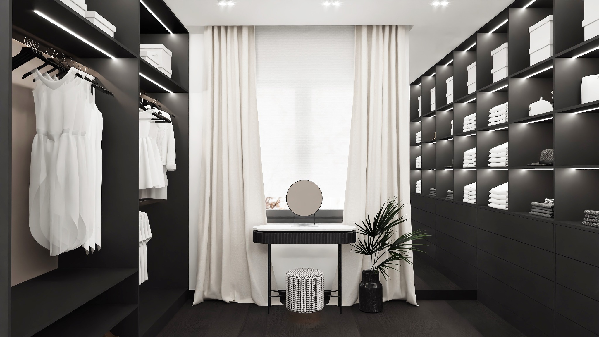 Czarno-biała garderoba z podświetlanymi półkami, ubraniami, toaletką z okrągłym lustrem, stołkiem w pepitkę i rośliną w marmurowym wazonie.