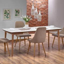 Stół rozkładany Barret, styl wykonania to skandynawski. Ważną cechą tego stołu jest to, że początkowo ma wymiar 80 x 90 ale jest w stanie rozłożyć się do 130 lub 190 cm.  bardzo przydatny jeśli każdy centymetr pomieszczenia się liczy. 