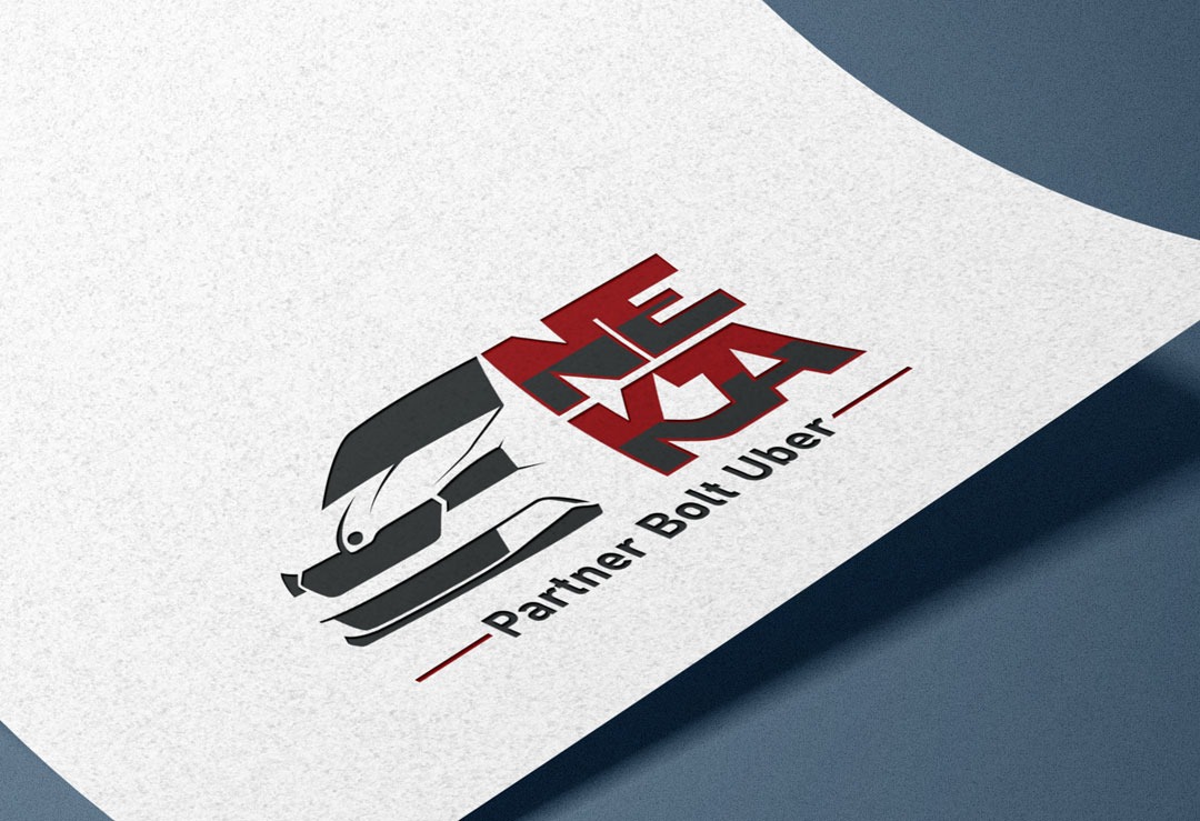 Logo przedstawiające stylizowany przód samochodu z nazwą firmy w kolorach czerwieni i szarości, umieszczone na białej kartce papieru z delikatną fakturą.