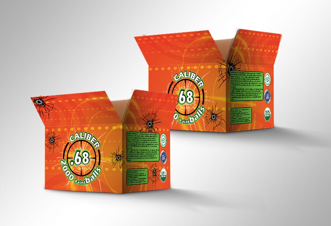 Dwa otwarte, pomarańczowe pudełka kartonowe z grafiką kulek do paintballa kaliber .68, ustawione pod lekkim kątem na jasnym tle.