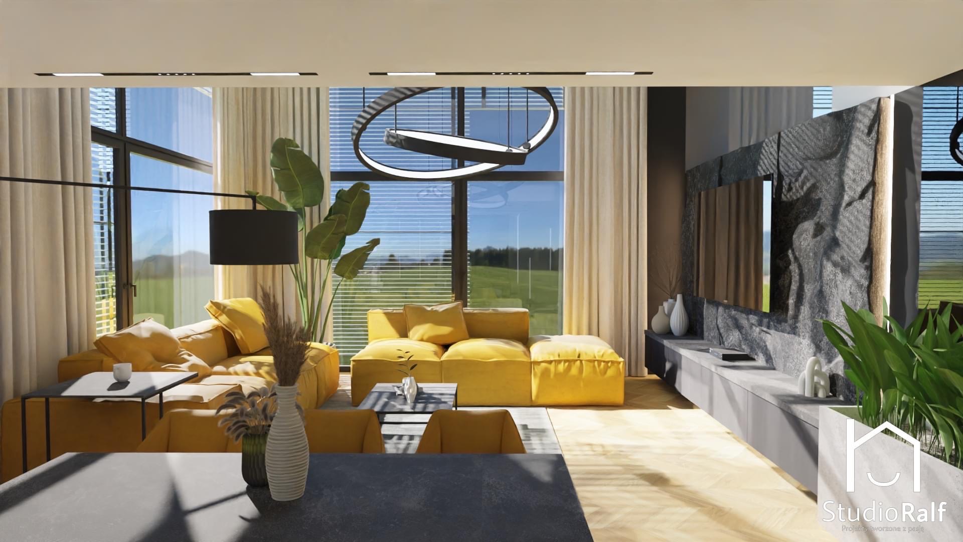 Wizualizacja salonu z żółtą sofą modułową, okrągłą lampą wiszącą i dużym oknem z widokiem na zieleń. Na pierwszym planie fragment stołu. W tle ściana z telewizorem w obudowie imitującej kamień.