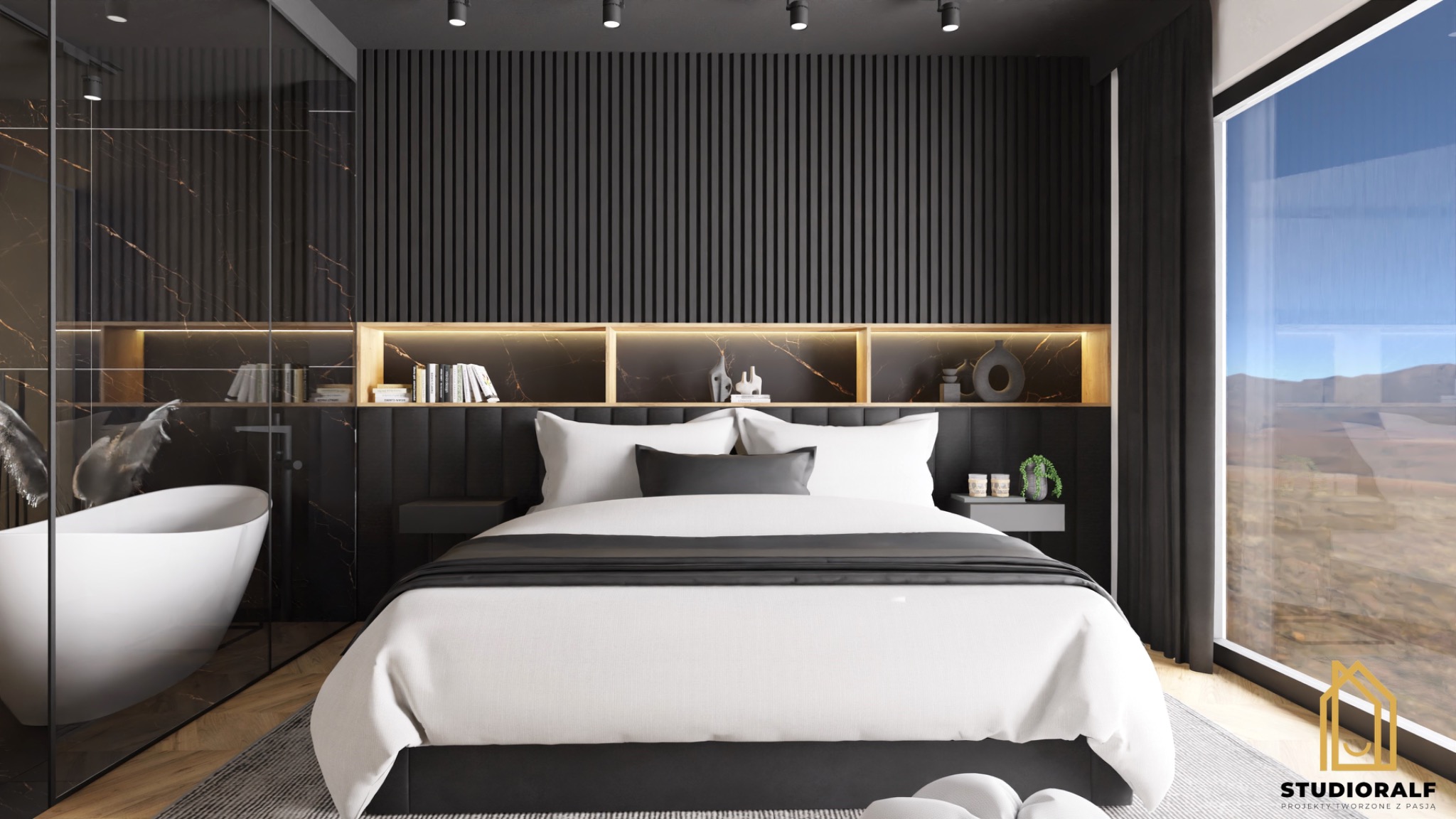 Nowoczesna sypialnia z łazienką oddzieloną szklaną ścianą, czarno-biała kolorystyka, drewniane półki z podświetleniem, widok na pustynny krajobraz za oknem.