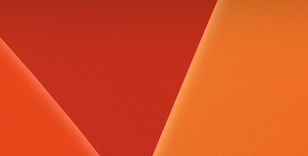 Abstrakcyjne tło w odcieniach czerwieni i pomarańczy z wyraźnymi liniami podziału, tworzące dynamiczną kompozycję.
