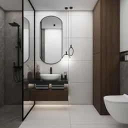 Nowoczesna łazienka z kabiną prysznicową typu walk-in, umywalką nablatową, podświetlaną szafką pod umywalką, wiszącą toaletą i dużym lustrem w czarnej ramie.