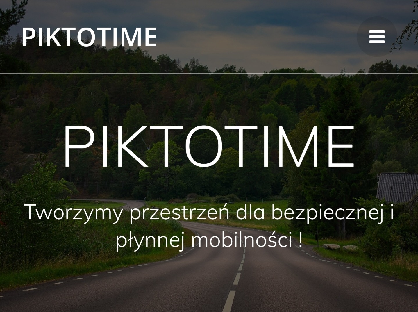 Logo firmy PIKTOTIME z Libiąża na tle drogi wijącej się przez zalesiony teren. Tekst: Tworzymy przestrzeń dla bezpiecznej i płynnej mobilności!