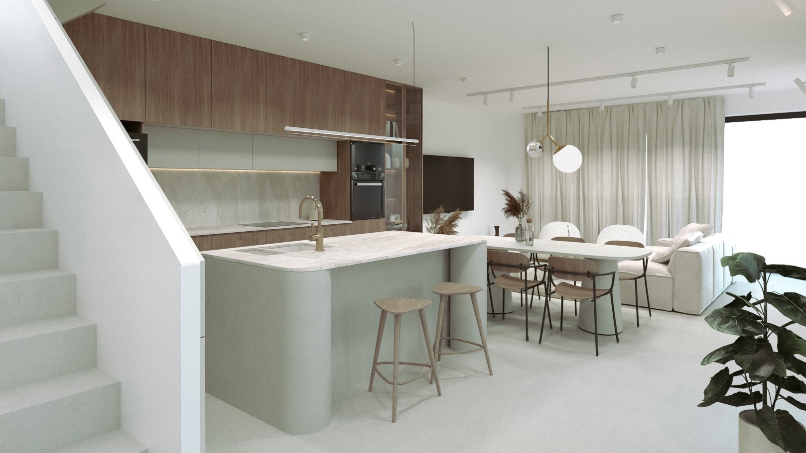 Jasna kuchnia z wyspą, drewnianymi szafkami i złotą armaturą, połączona z jadalnią i salonem, widok z perspektywy schodów.