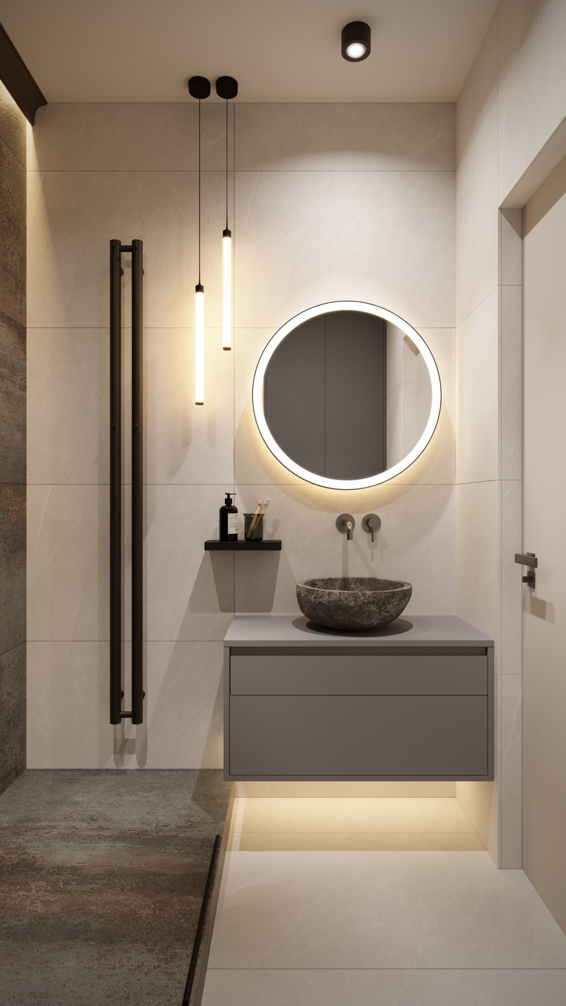 Nowoczesna łazienka z okrągłym lustrem podświetlanym LED, kamienną umywalką nablatową i minimalistyczną szafką pod umywalką z podświetleniem od dołu, uzupełniona o czarny grzejnik drabinkowy...
