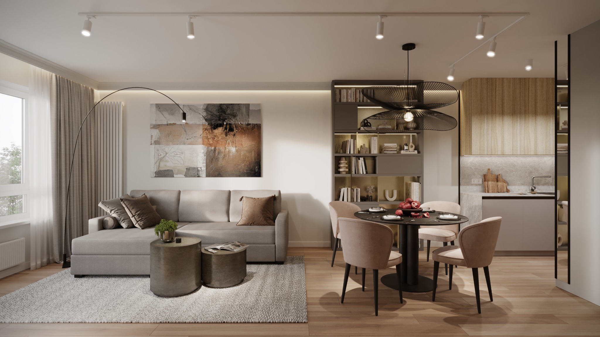 Jasne, nowoczesne wnętrze mieszkania z szarą sofą, okrągłym stolikiem kawowym, abstrakcyjnym obrazem, regałem z książkami i jadalnią z okrągłym stołem oraz widocznym fragmentem kuchni z drewnianymi...