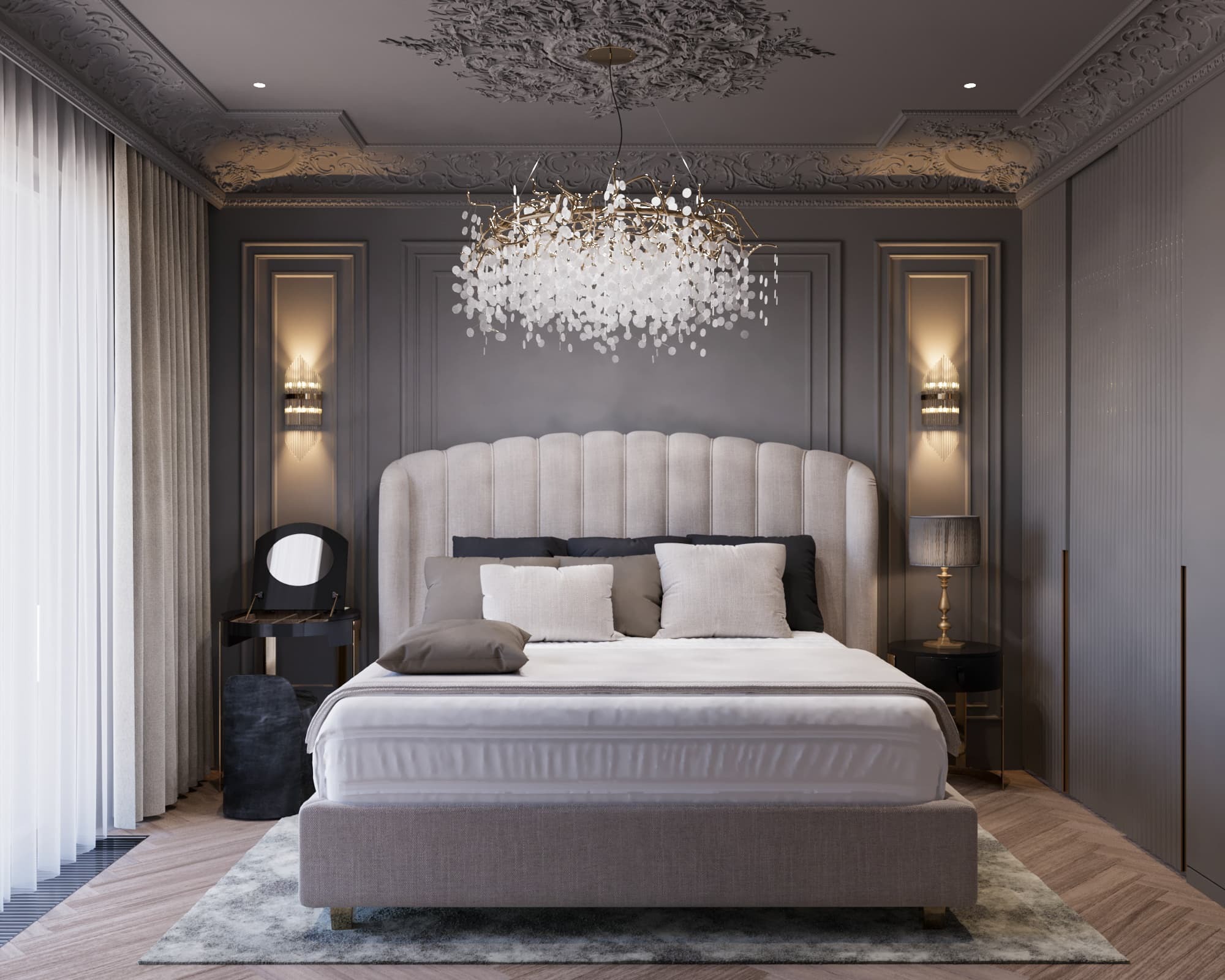 Elegancka sypialnia w odcieniach szarości z dekoracyjnym oświetleniem sufitowym, łóżkiem kontynentalnym z zagłówkiem w stylu glamour, toaletką z owalnym lustrem i wzorzystym dywanem.