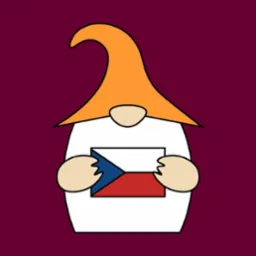 Kreskówkowy gnom z pomarańczową czapką trzymający flagę Czech na bordowym tle.