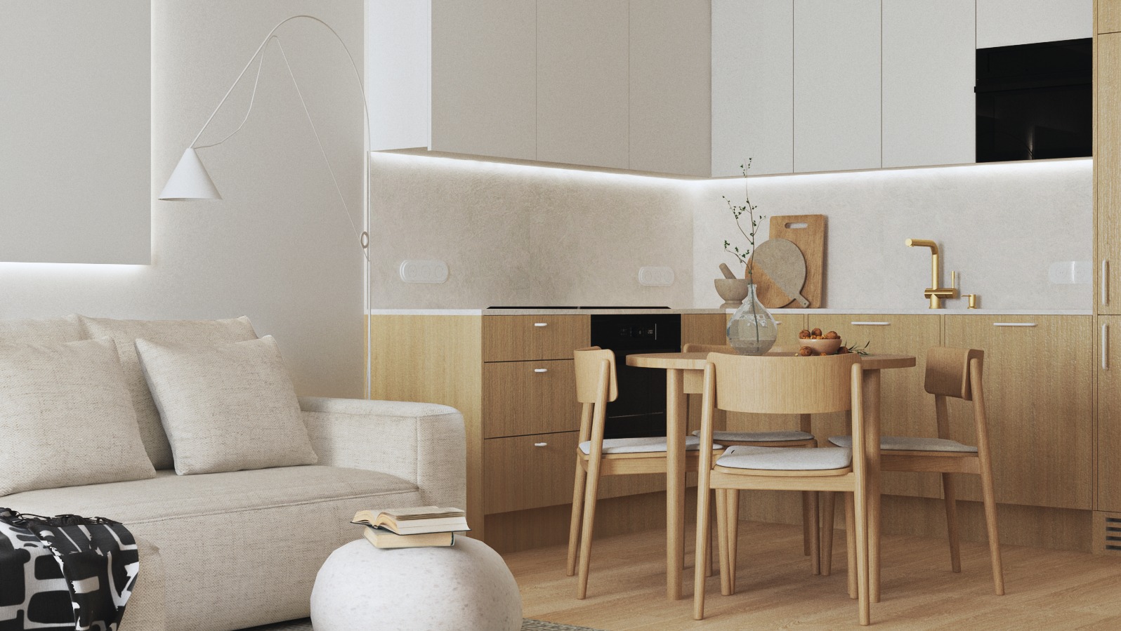Jasna kuchnia z drewnianymi szafkami, okrągłym stołem i krzesłami w stylu skandynawskim, widok z salonu z beżową sofą i lampą łukową