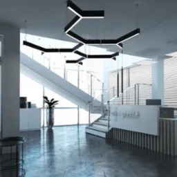 Nowoczesne biuro z recepcją w odcieniach szarości i bieli, heksagonalne lampy sufitowe, schody z przeszkloną balustradą, rośliny doniczkowe w metalowych osłonkach, betonowa podłoga w kształcie...