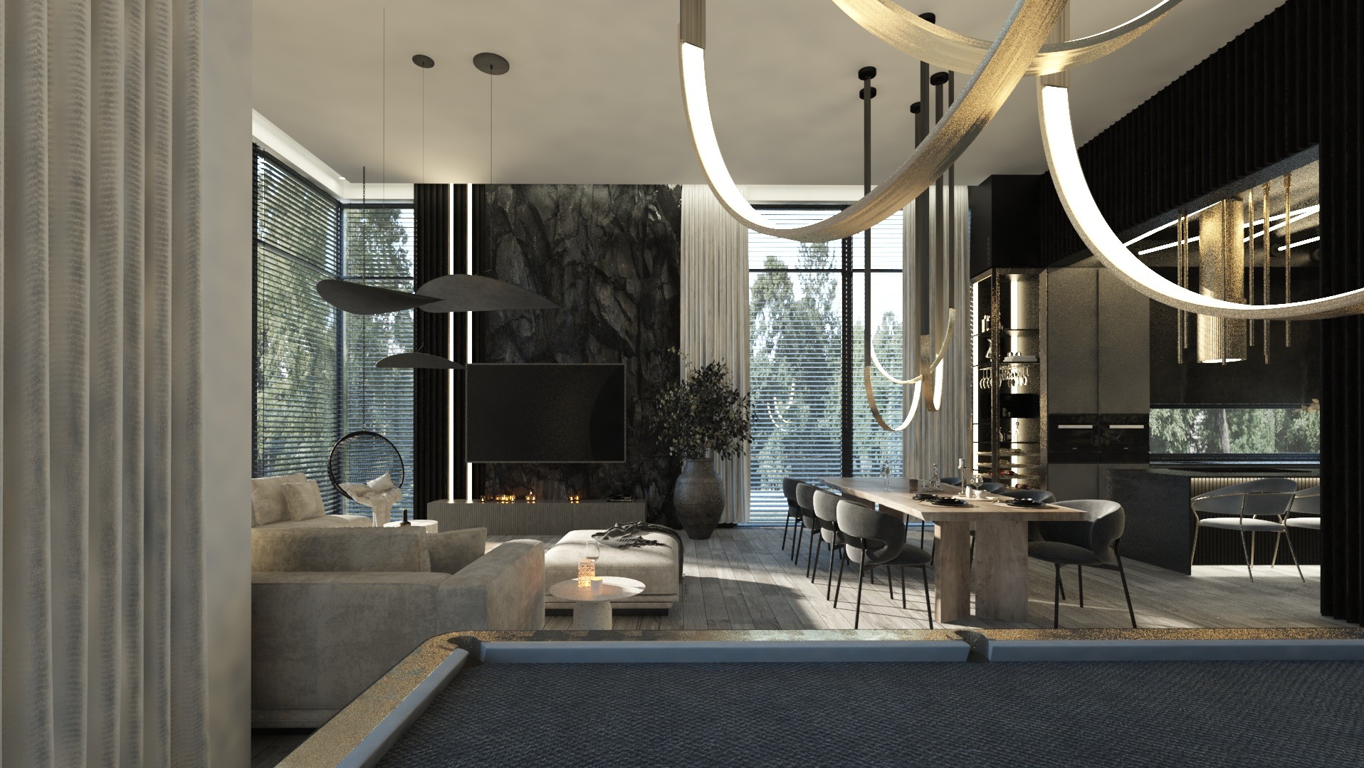 Eleganckie wnętrze: salon z marmurową ścianą, nowoczesnym oświetleniem i stołem jadalnym, widok na kuchnię w tle, z bilardem na pierwszym planie.