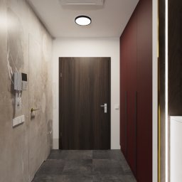APART DESIGN - Nowoczesny przedpokój z marmurową ścianą, ciemnymi płytkami podłogowymi, wbudowaną klimatyzacją sufitową i bordową szafą z oświetleniem LED.