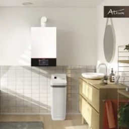 Nowoczesna łazienka z wiszącym białym kotłem grzewczym z ekranem dotykowym i stacją uzdatniania wody, drewniana szafka z umywalką i okrągłym lustrem.