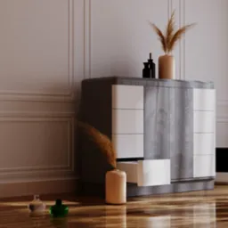 Nowoczesna komoda z szufladami w odcieniach szarości i bieli, z otwartą szufladą, dekoracyjnymi wazonami i trawą pampasową, na błyszczącej drewnianej podłodze przy ścianie z ozdobnymi panelami.