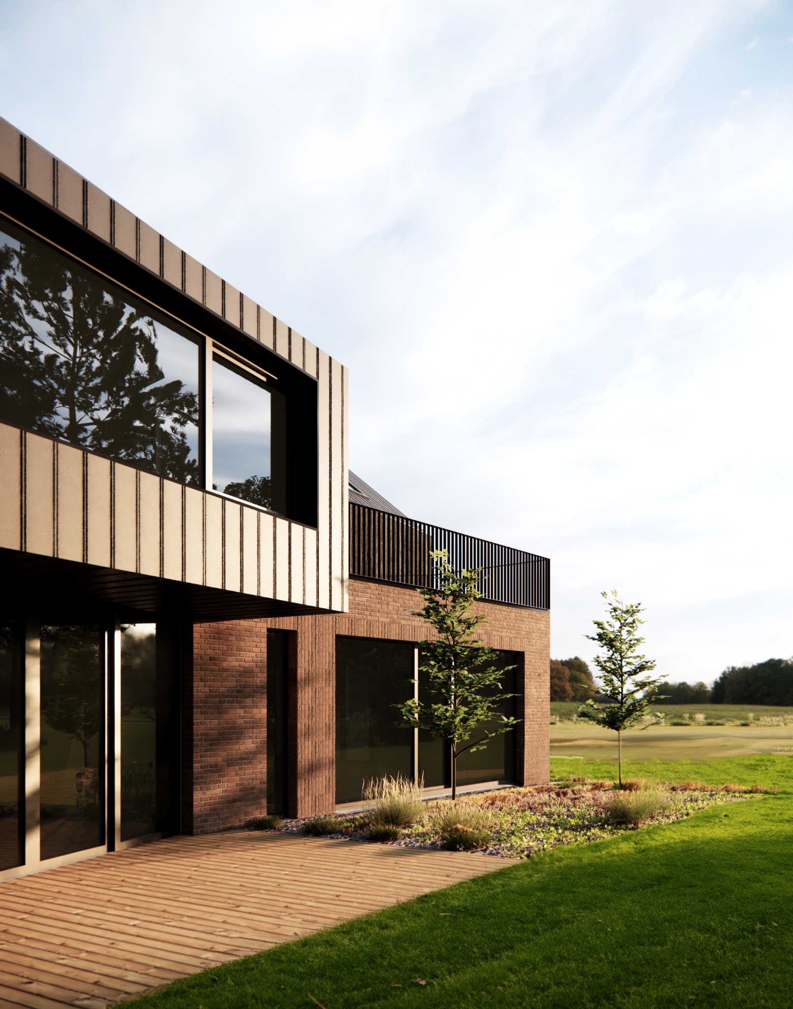 Nowoczesny dom z cegły klinkierowej z dużymi przeszkleniami i drewnianym tarasem, otoczony zielonym trawnikiem i młodymi drzewkami, widok na krajobraz Lubelszczyzny.