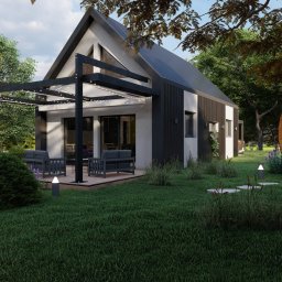 Woody House - Nowoczesny dom z dachem dwuspadowym i pergolą, obok okrągła sauna beczka, otoczone zielonym ogrodem z kwitnącą lawendą.